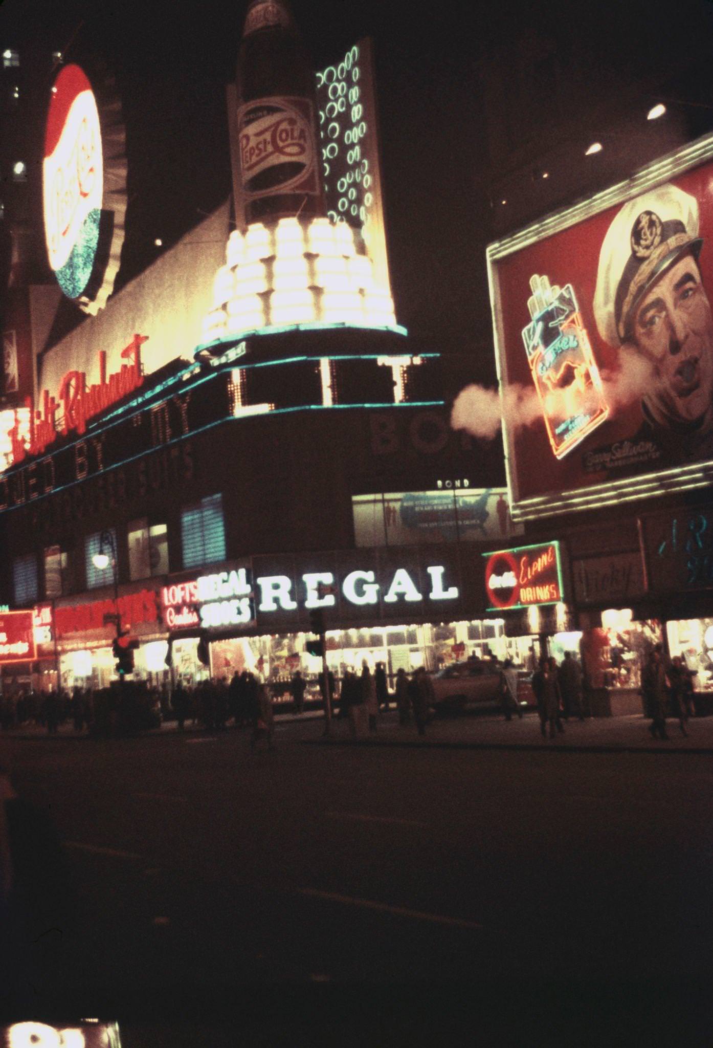 Advertisements For Camel Cigarettes And Pepsi-Cola In Times Square, Manhattan, 1957.