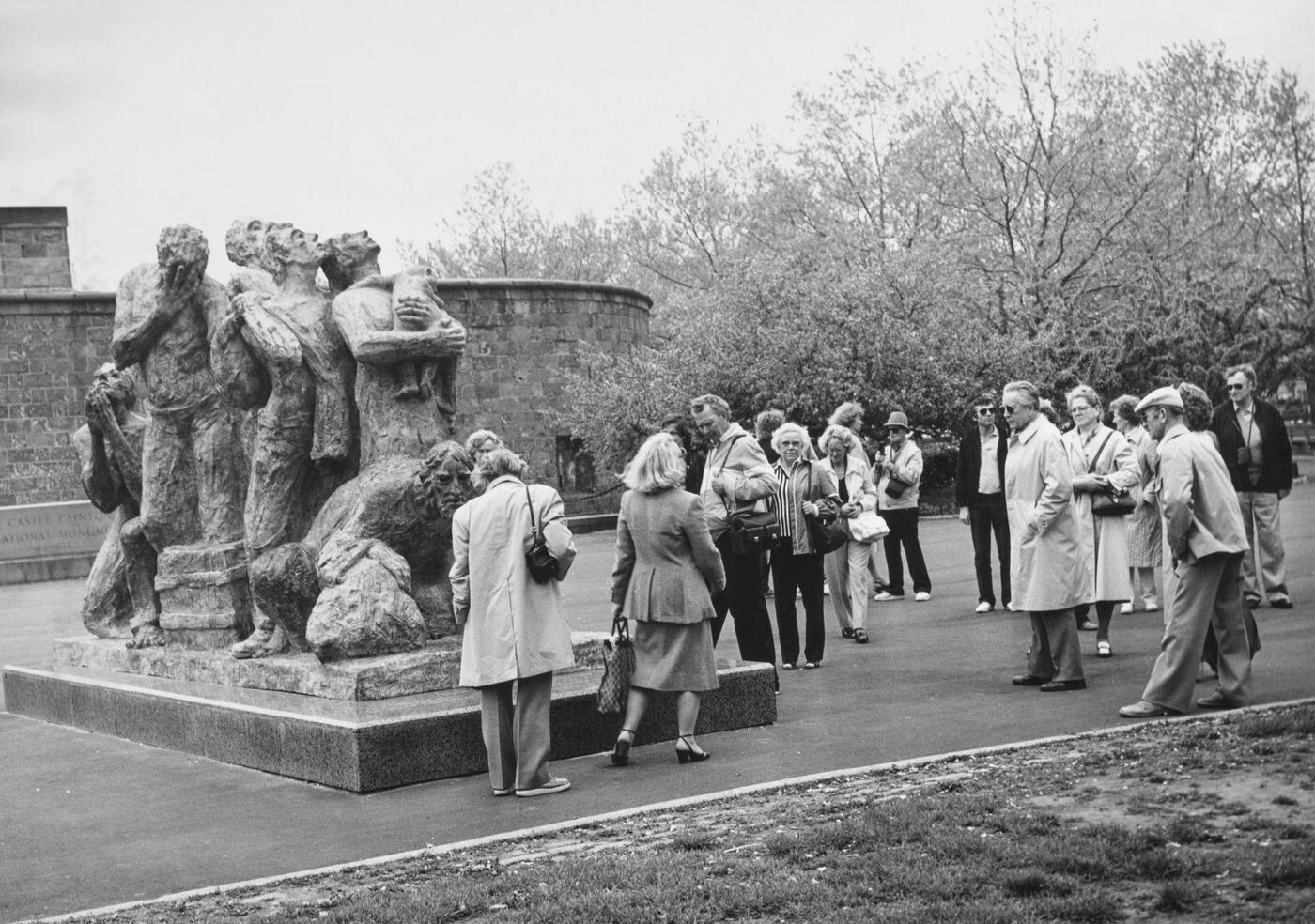 Tourists Admire 'The Immigrants' Sculpture, Battery Park, Manhattan, 1982