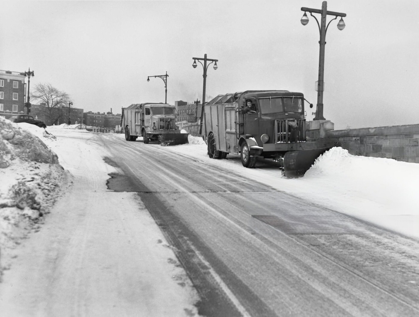 Department Of Sanitation Trucks With Plows Kept The Roads Clear Near Kew Gardens In Queens, New York City After A Blizzard, 1948.