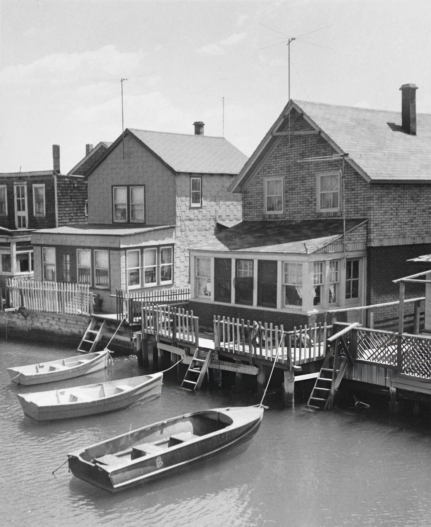 Three Rowboats Tethered To The Rear Of Houses In Ramblersville, Howard Beach, Queens, New York City, 1950S.