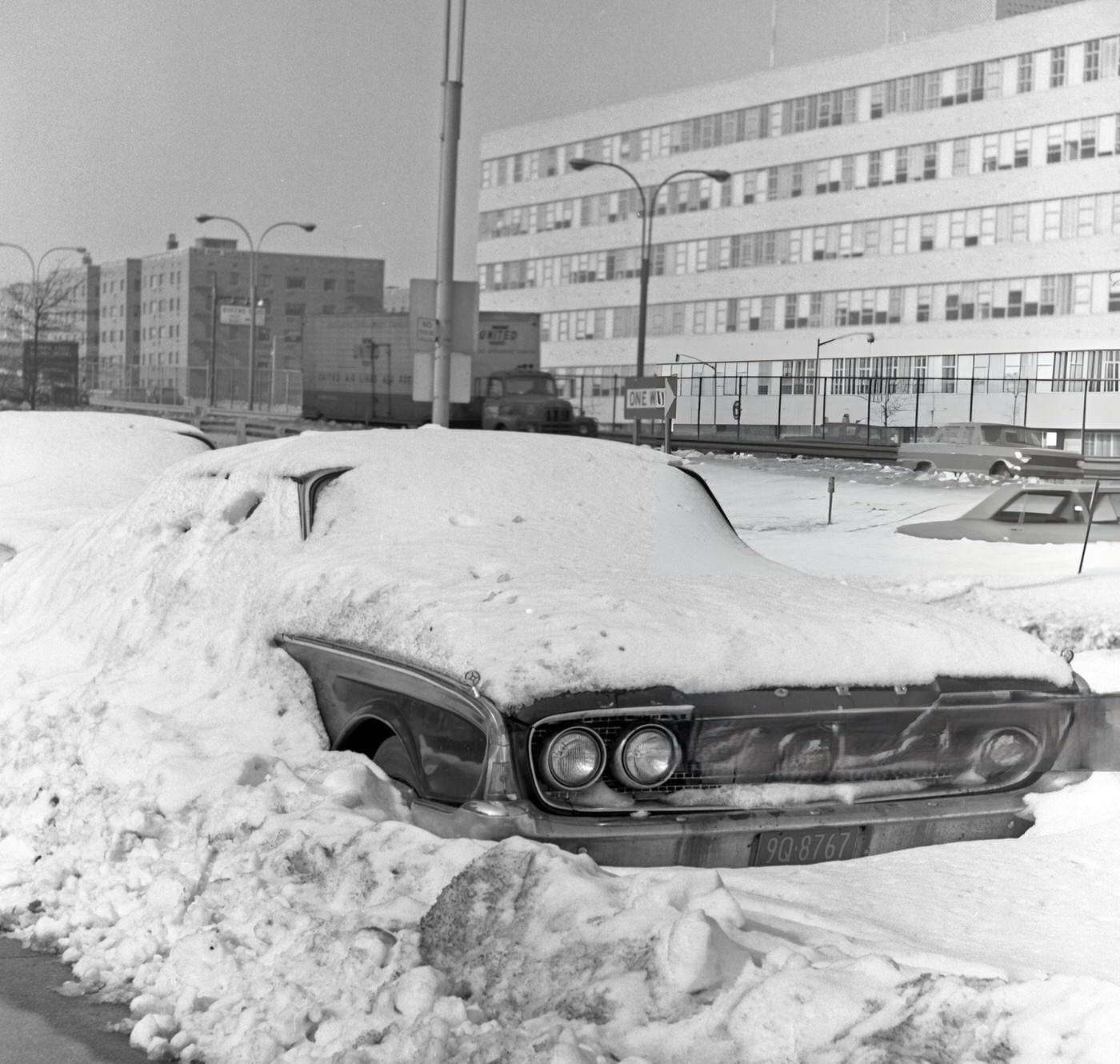 A Ford Sedan Buried In Snow Along The Horace Harding Expressway In Rego Park, Queens, 1967.