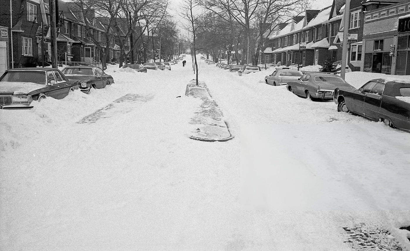 Rows Of Parked Cars Partially Buried In Deep Snow Along A Residential Street In Queens During The Blizzard Of 1978.