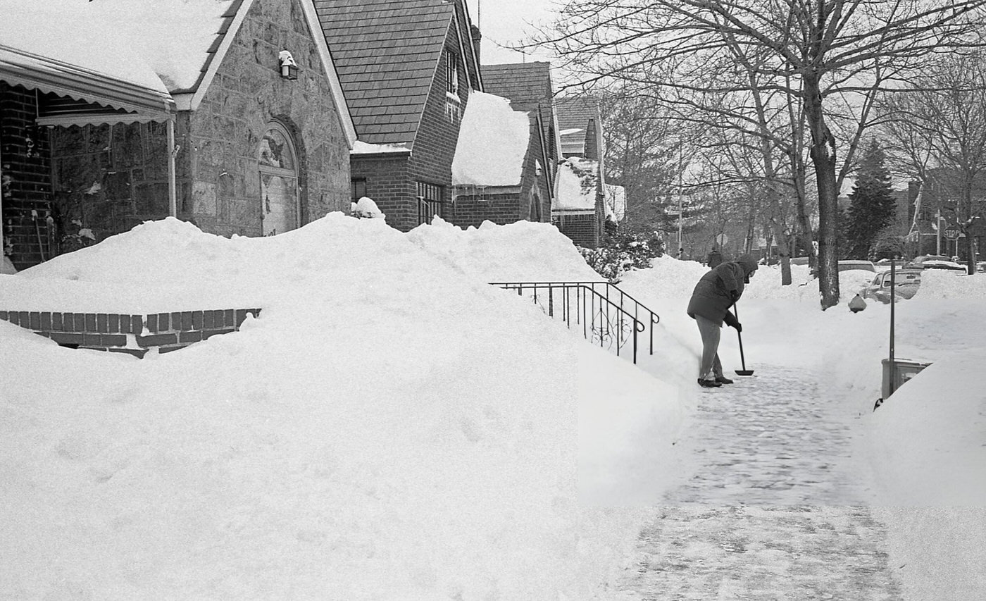 A Home Owner In Queens Chips Away At Ice And Snow On His Sidewalk In The Aftermath Of The Blizzard Of 1978.