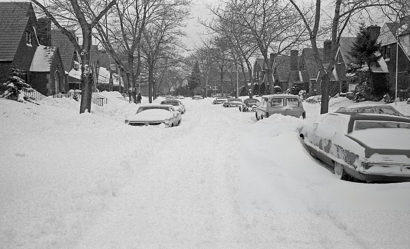 Rows Of Parked Cars Sit Buried Under Deep Snow Drifts On A Residential Street In Queens In The Aftermath Of The Blizzard Of 1978.