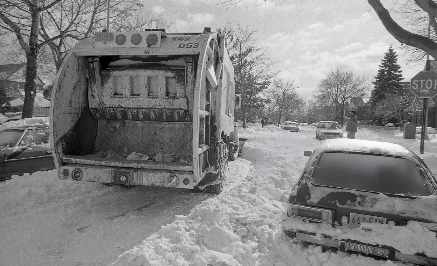 A New York City Sanitation Plow Clears Snow At A Residential Intersection In The Aftermath Of The Blizzard Of 1978.