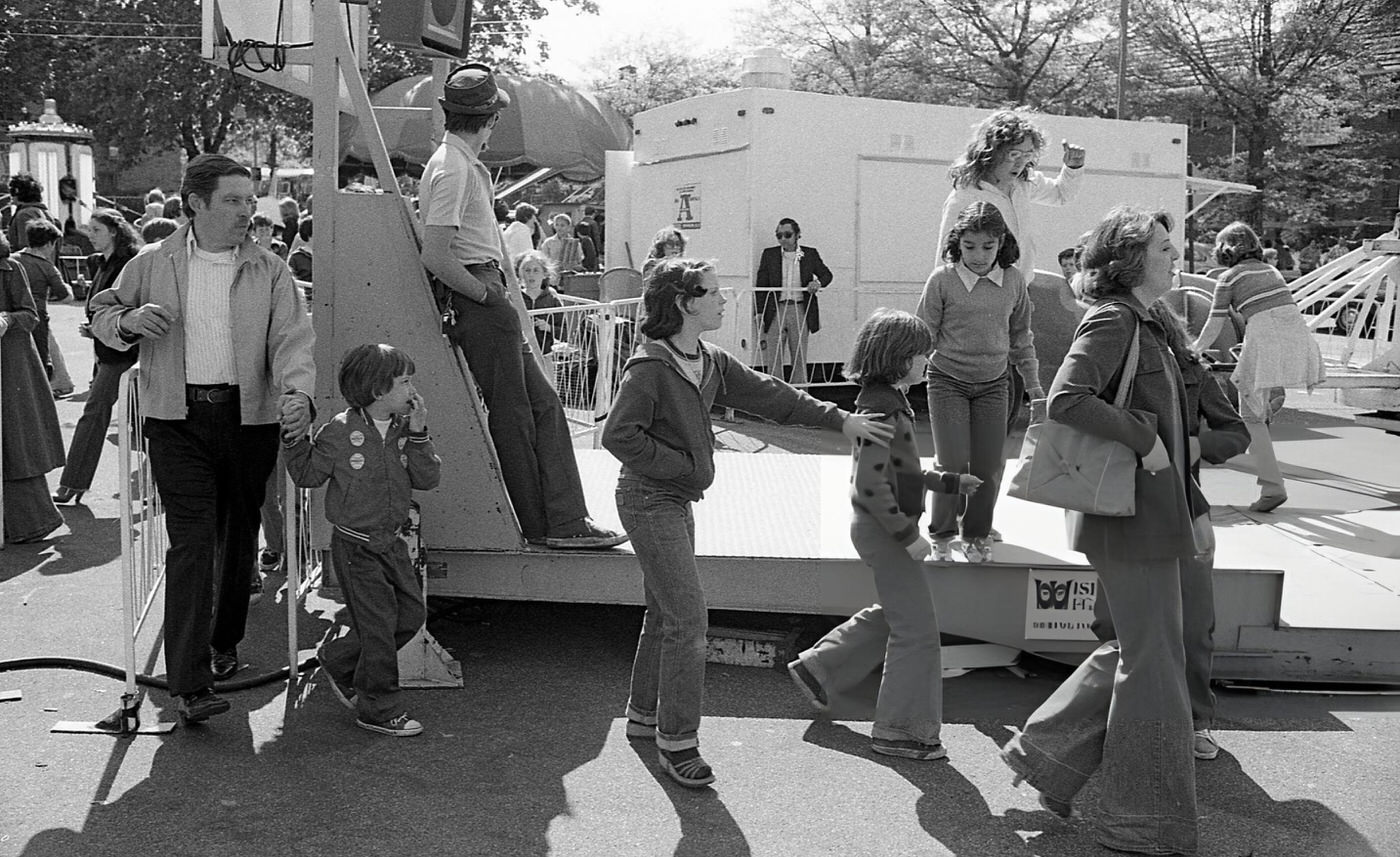 Parents And Children Exiting The 'Sizzler' Ride At The Resurrection Ascension Church Carnival In Rego Park, Queens, 1979.