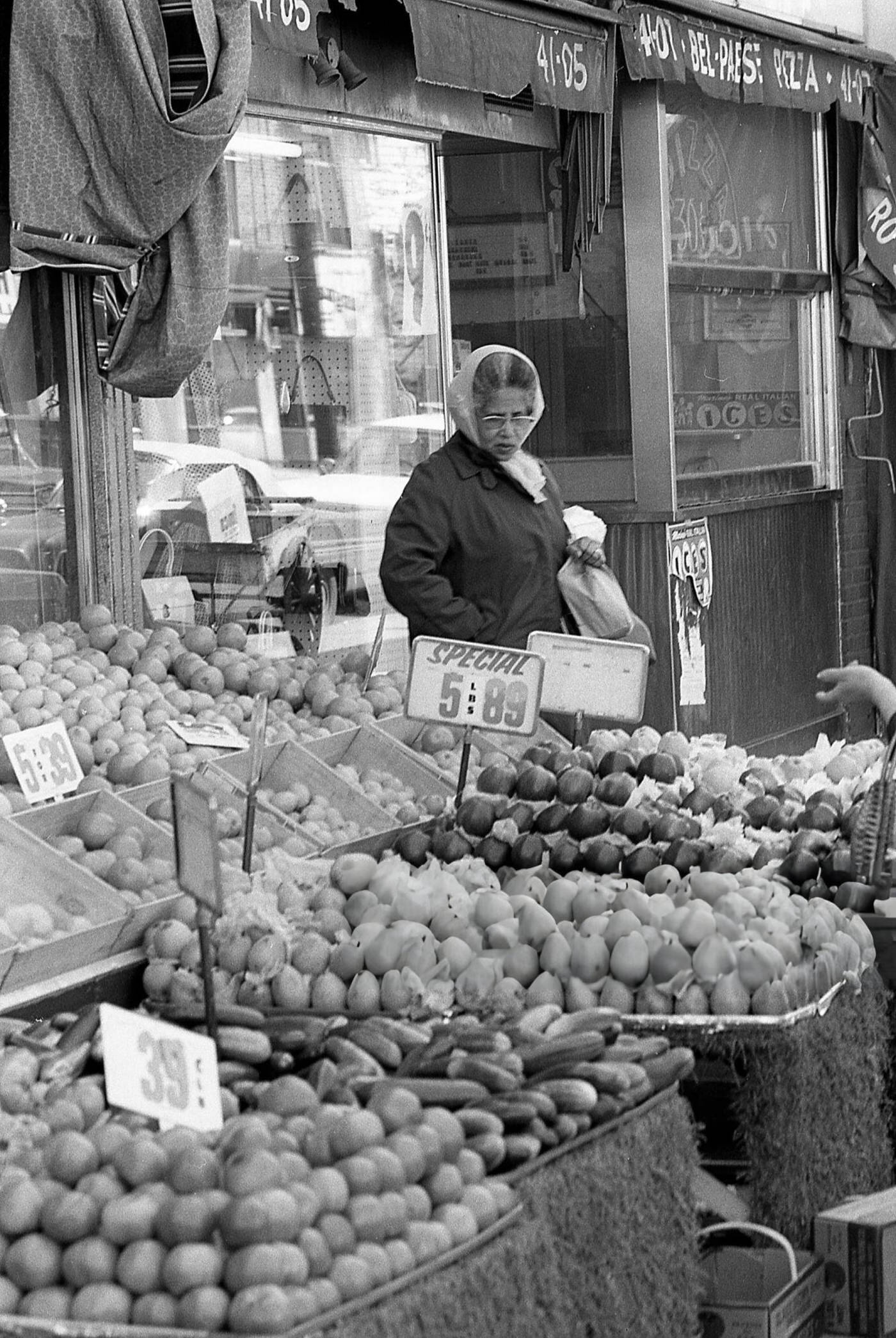 A Woman Exiting A Produce Market On National Street In Corona, Queens, 1970.