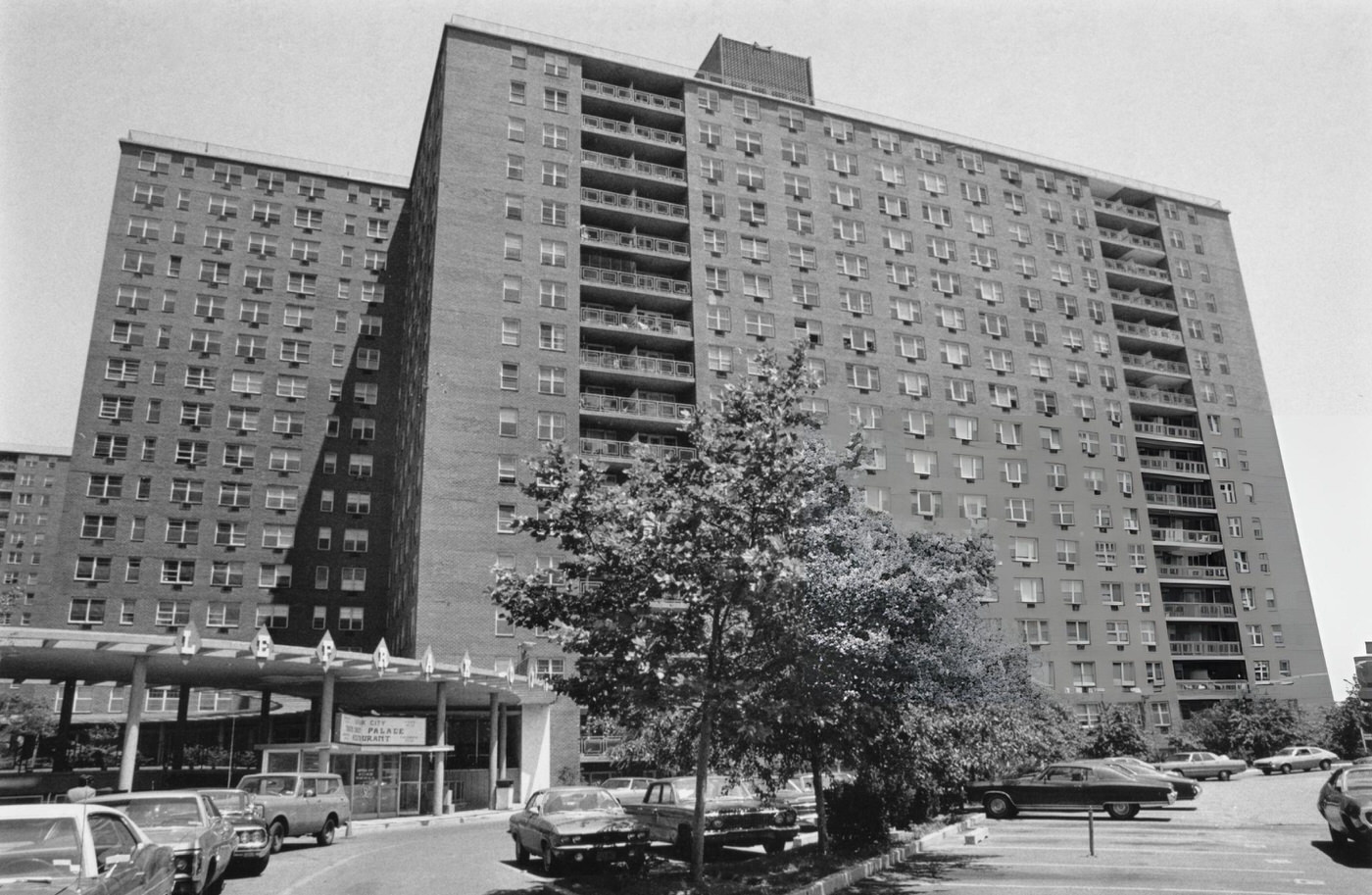 Cars Parked In The Lot In Front Of Lefrak City, An Apartment Block In Queens, 1970S.
