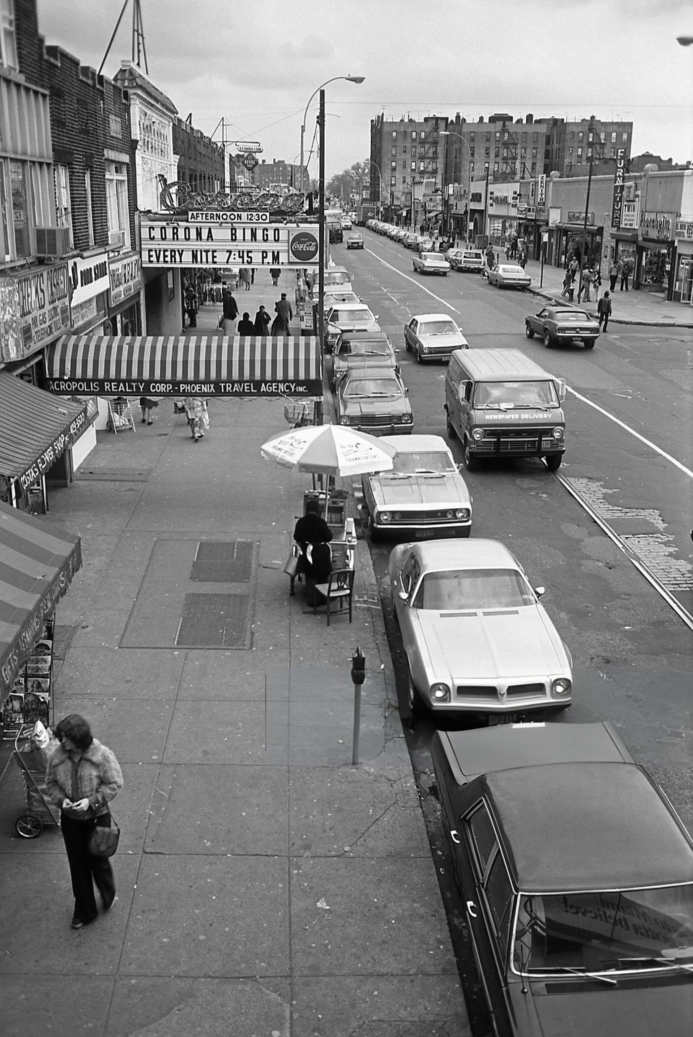A Bingo Parlor And Other Small Businesses Lining Roosevelt Avenue In Corona, Queens, 1970S.