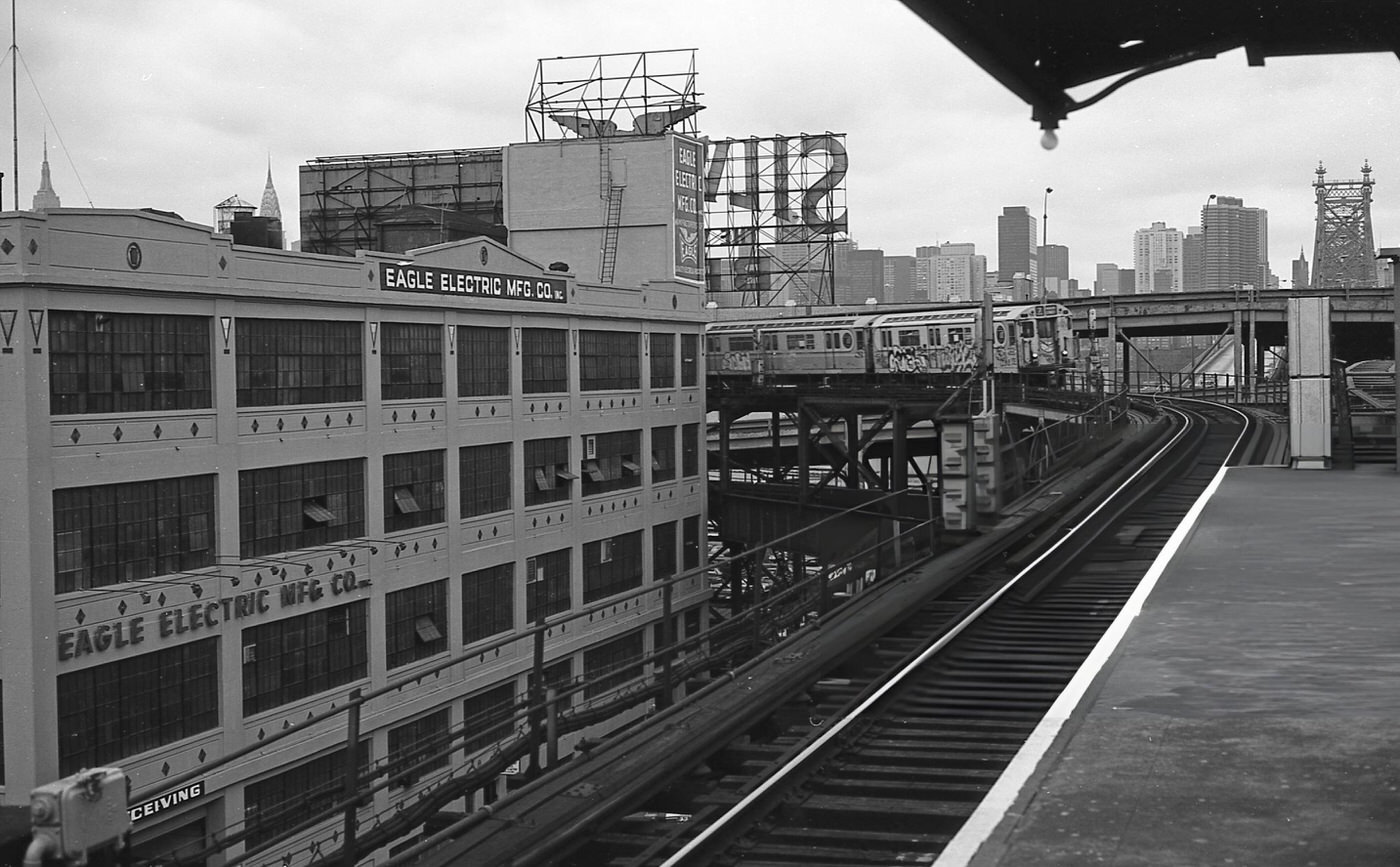 A 7 Train Pulling Into The Queens Plaza Elevated Subway Station In Queens' Long Island City Neighborhood, 1974.