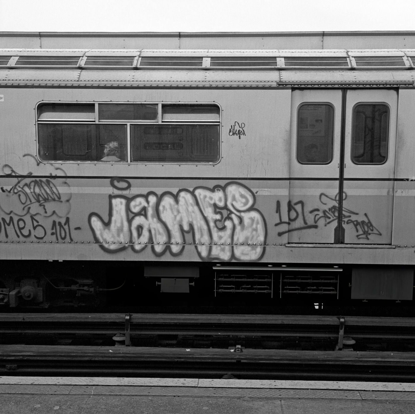 Graffiti On The Side Of A Train At The 103Rd Street-Corona Plaza Subway Station, Queens, 1975.