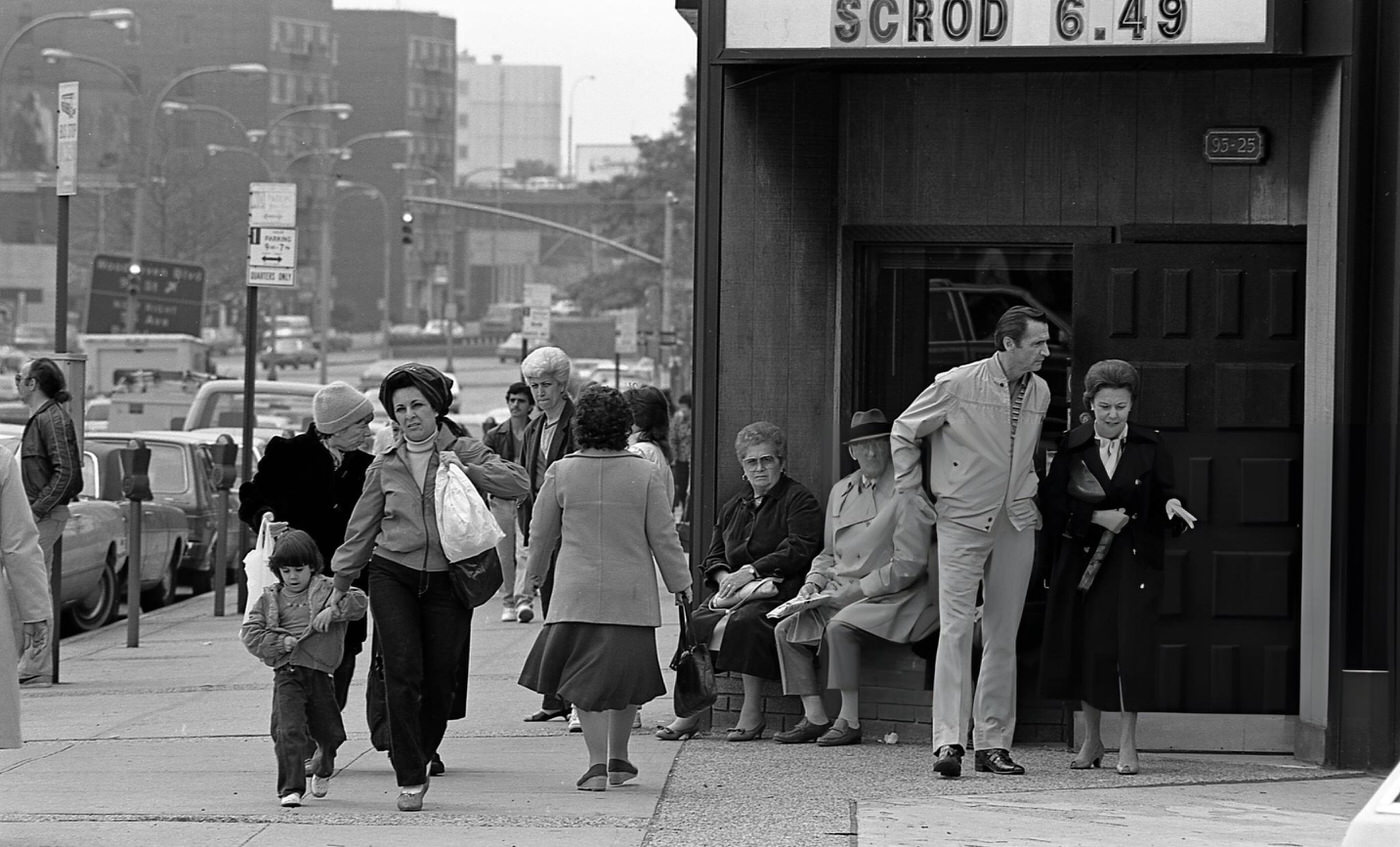 Pedestrians At The Corner Of Queens And Junction Boulevards In Rego Park, Queens, 1984.
