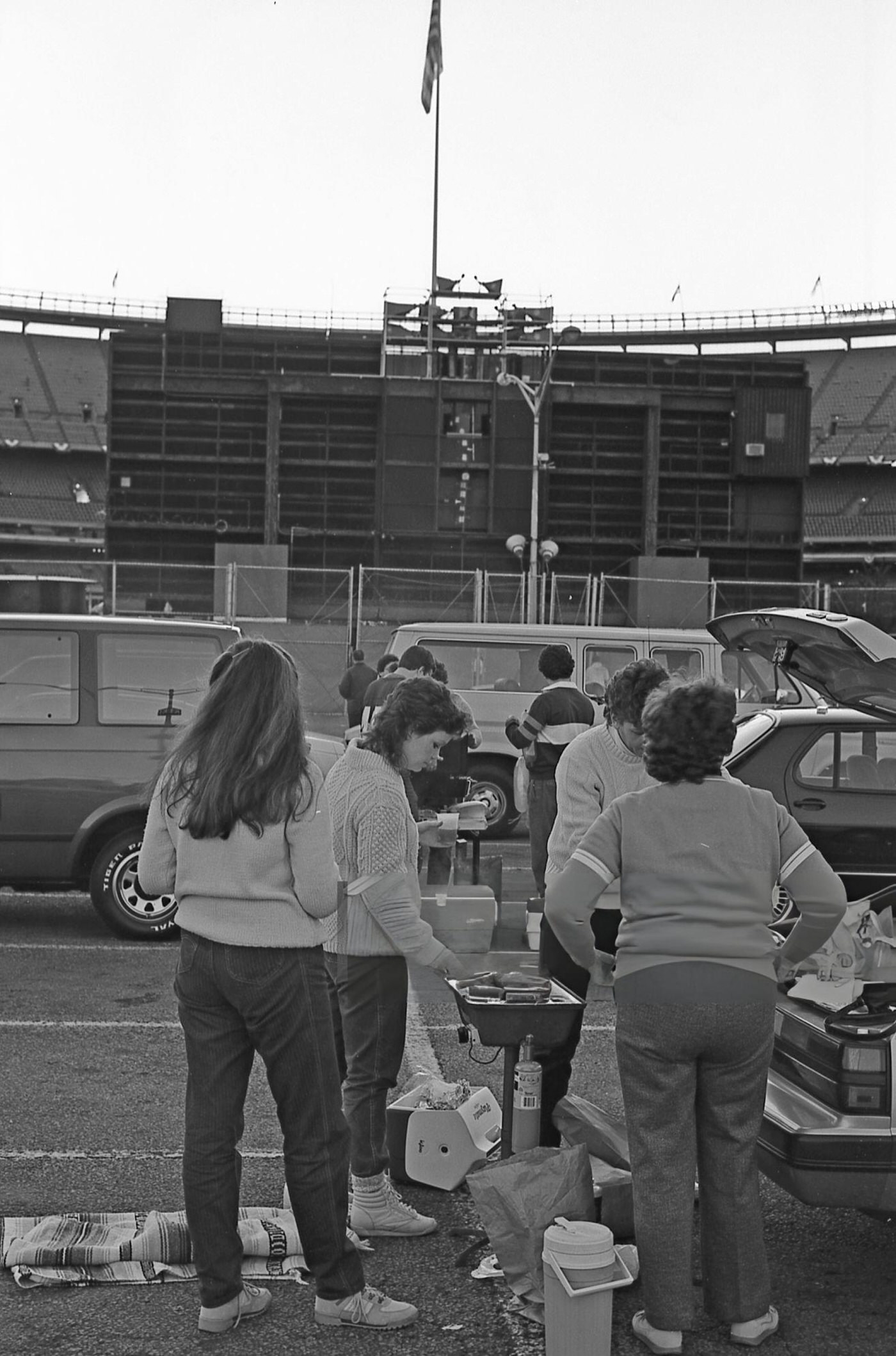 Baseball Fans Tailgate In A Parking Lot Outside Shea Stadium Before Game Six Of The 1986 World Series, Corona, Queens, 1986.