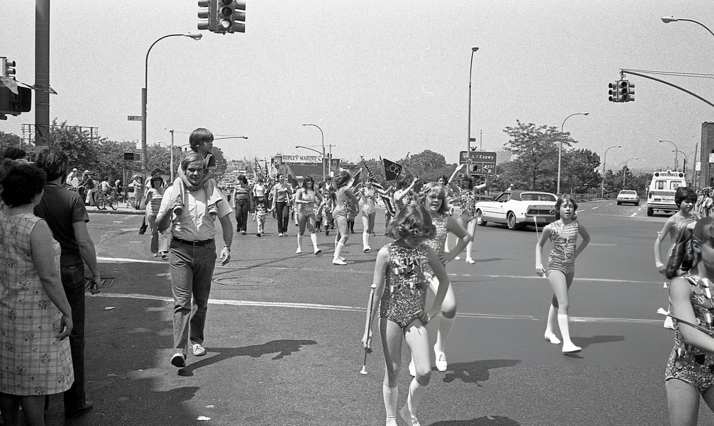 Majorettes From A Youth Marching Band Work Their Routine During The Memorial Day Parade In Maspeth, Queens, 1981.