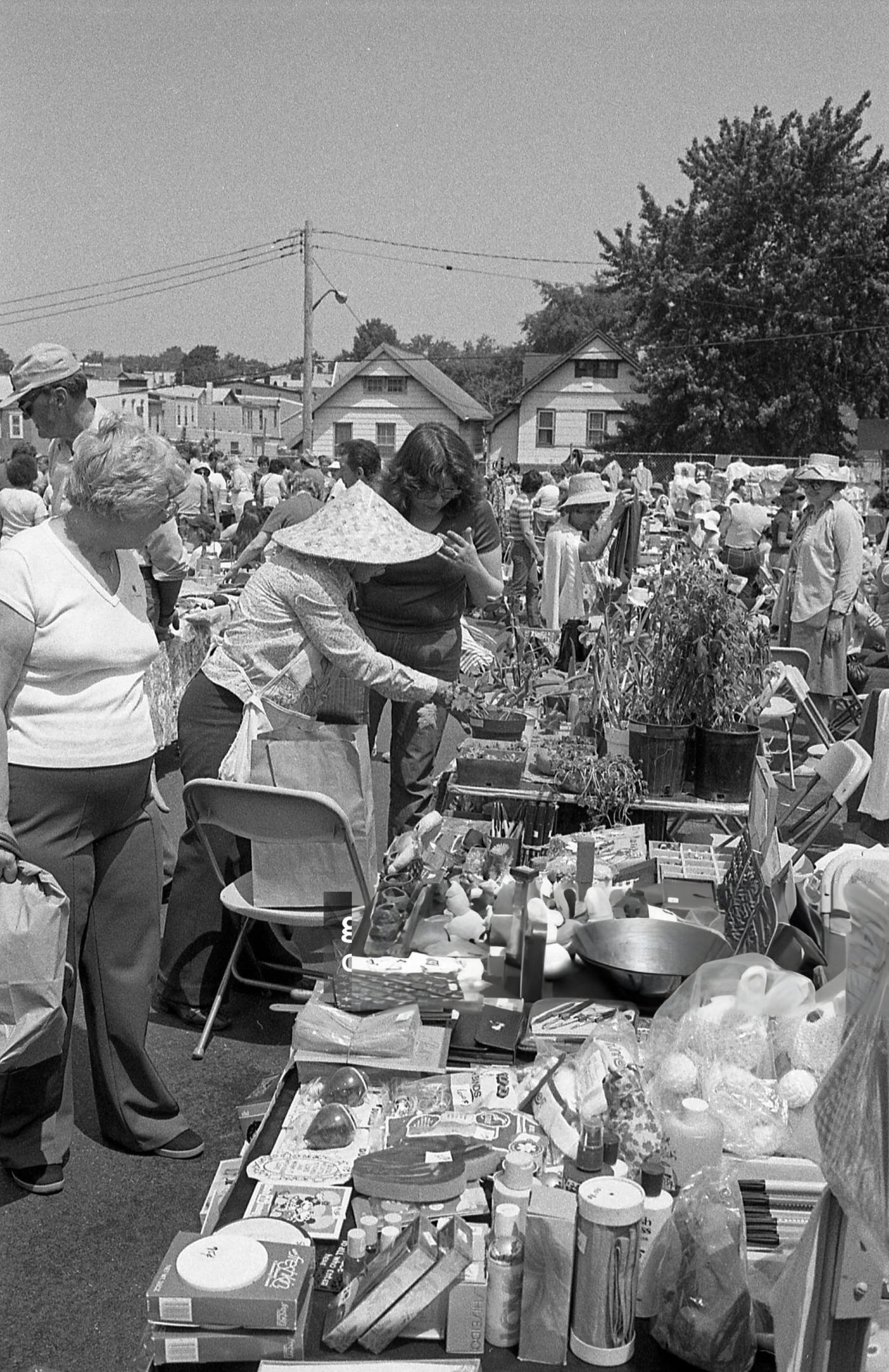 People Browse Vendor'S Tables At An Outdoor Flea Market In Maspeth, Queens, 1981.
