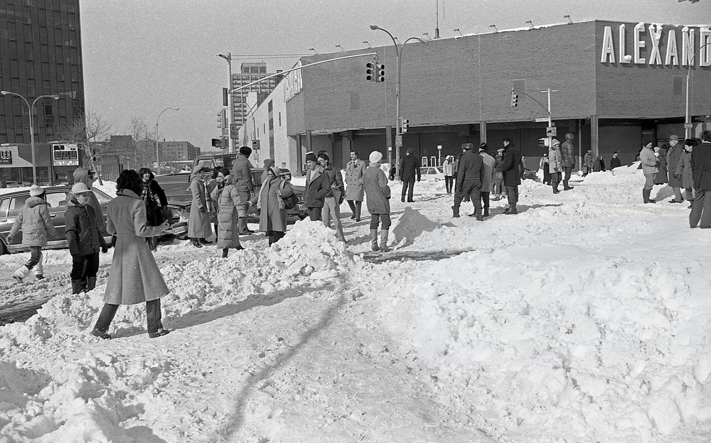 Pedestrians Walk Through Snow On Queens Boulevard At The 63Rd Drive Intersection In Rego Park, Queens, 1983.