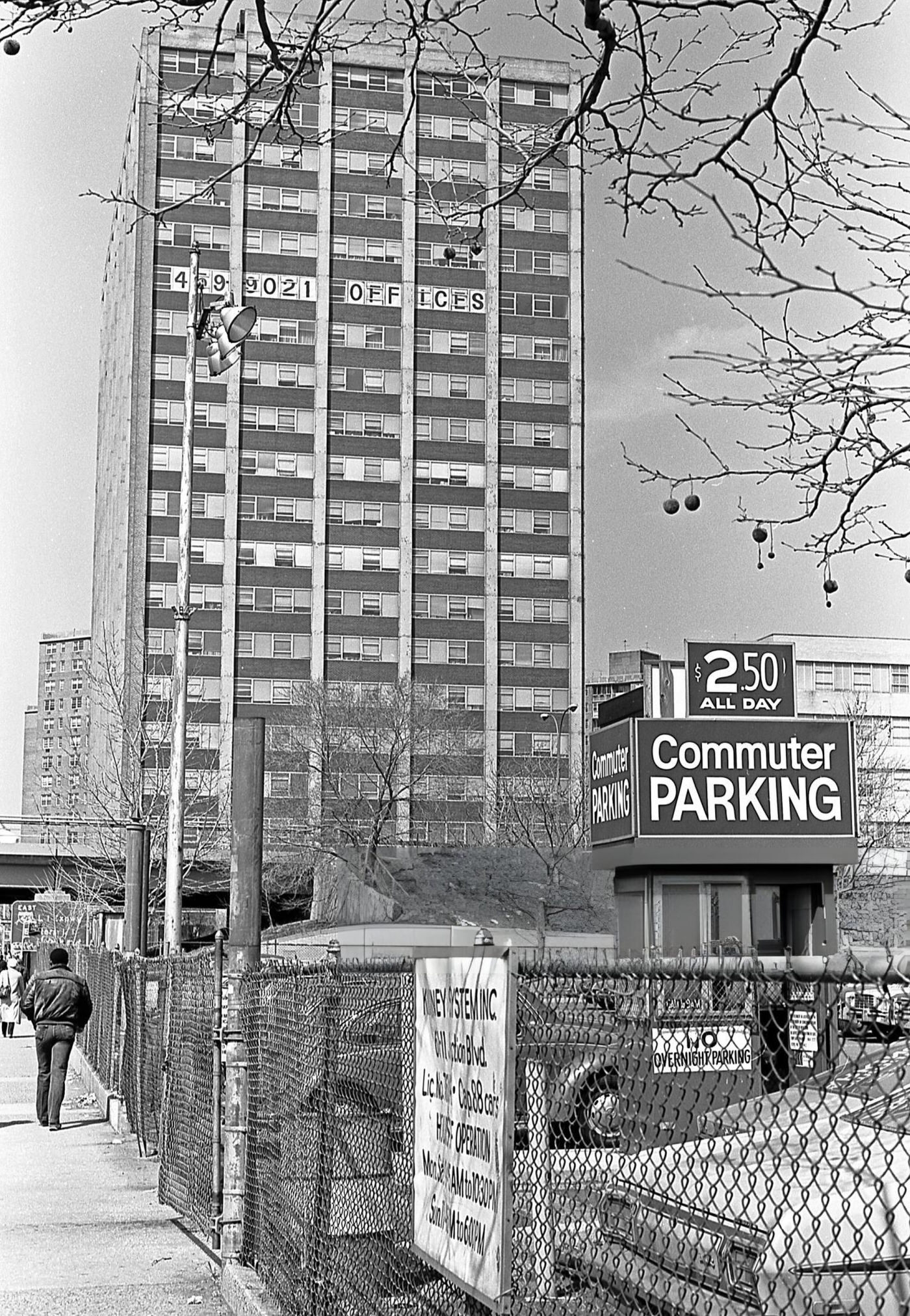 A Commuter Parking Lot On Junction Boulevard, Near The Horace Harding Expressway Overpass, In Elmhurst, Queens, 1984.