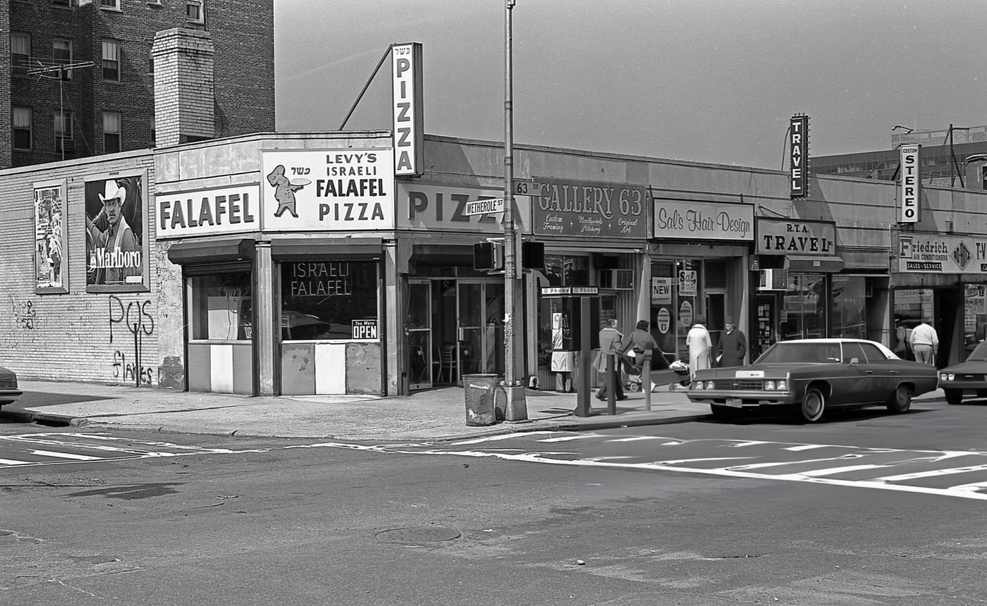 Retail Shops At The Intersection Of 63Rd Drive And Wetherole Street In Rego Park, Queens, Including Levy'S Israeli Falafel And Pizzeria And The Gallery 63 Art Shop, 1984.