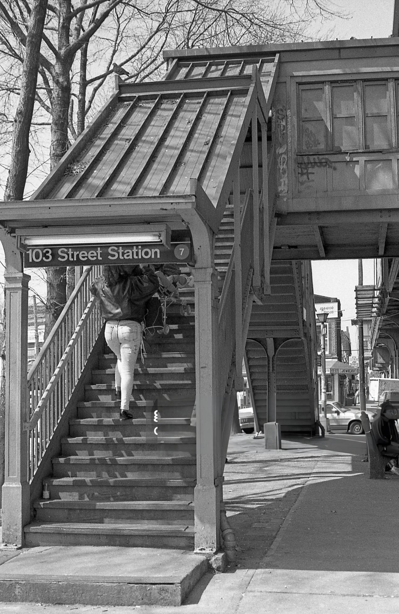 A Commuter Carries A Baby Stroller Up The Staircase To The Elevated Subway On Roosevelt Avenue At 103Rd Street In Corona, Queens, 1990S.