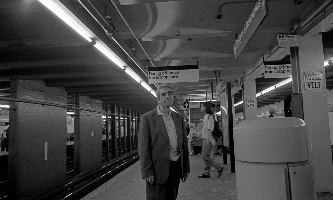 A Man Stands On The Subway Platform At The Roosevelt Avenue Station In Jackson Heights, Queens, 1993.