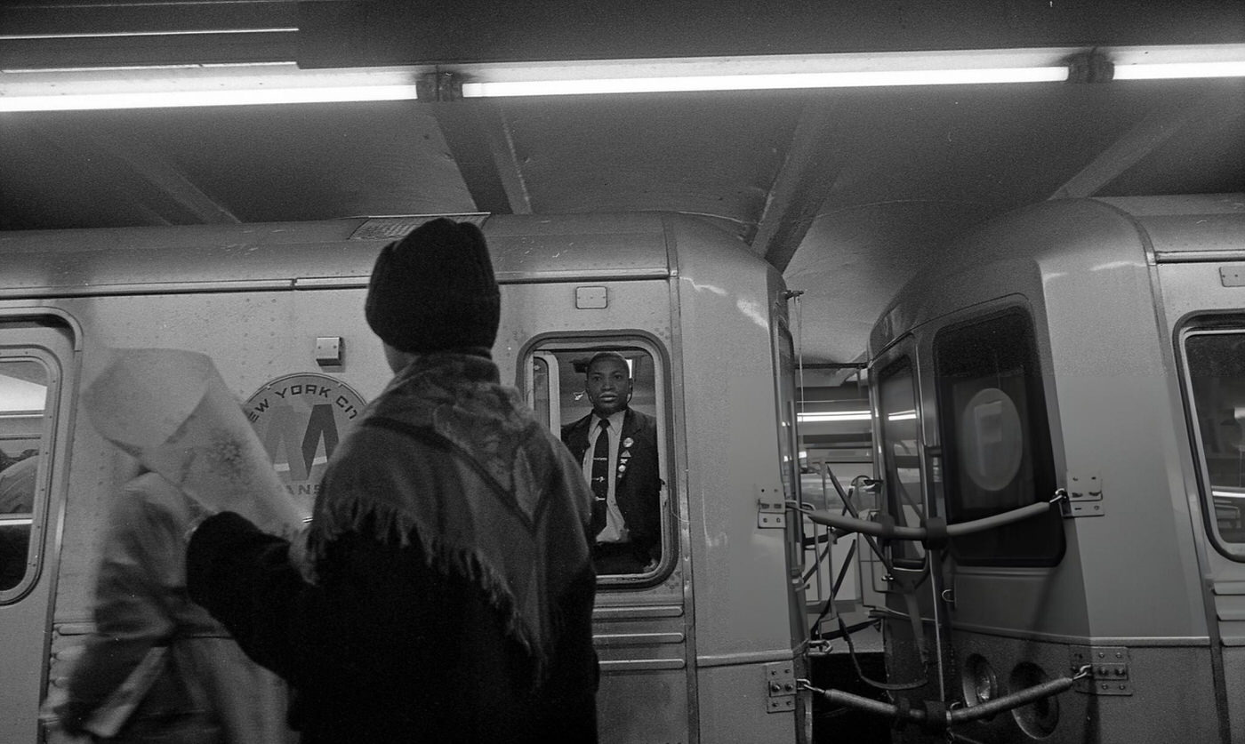 A Subway Conductor On An F Train In The Roosevelt Avenue Station In Jackson Heights, Queens, 1994.
