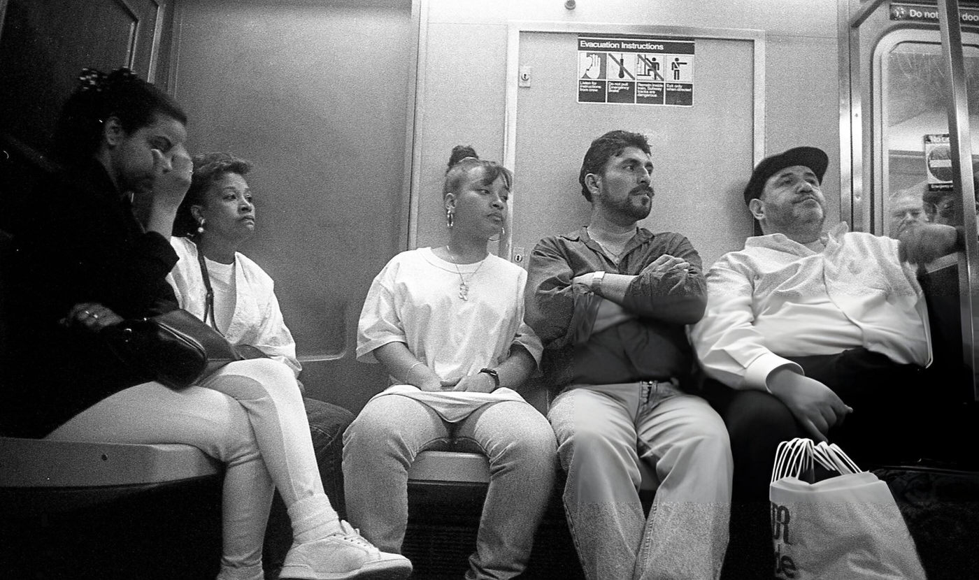 Commuters Seated On An E Train At The Queens Plaza Station, Queens, 1995.