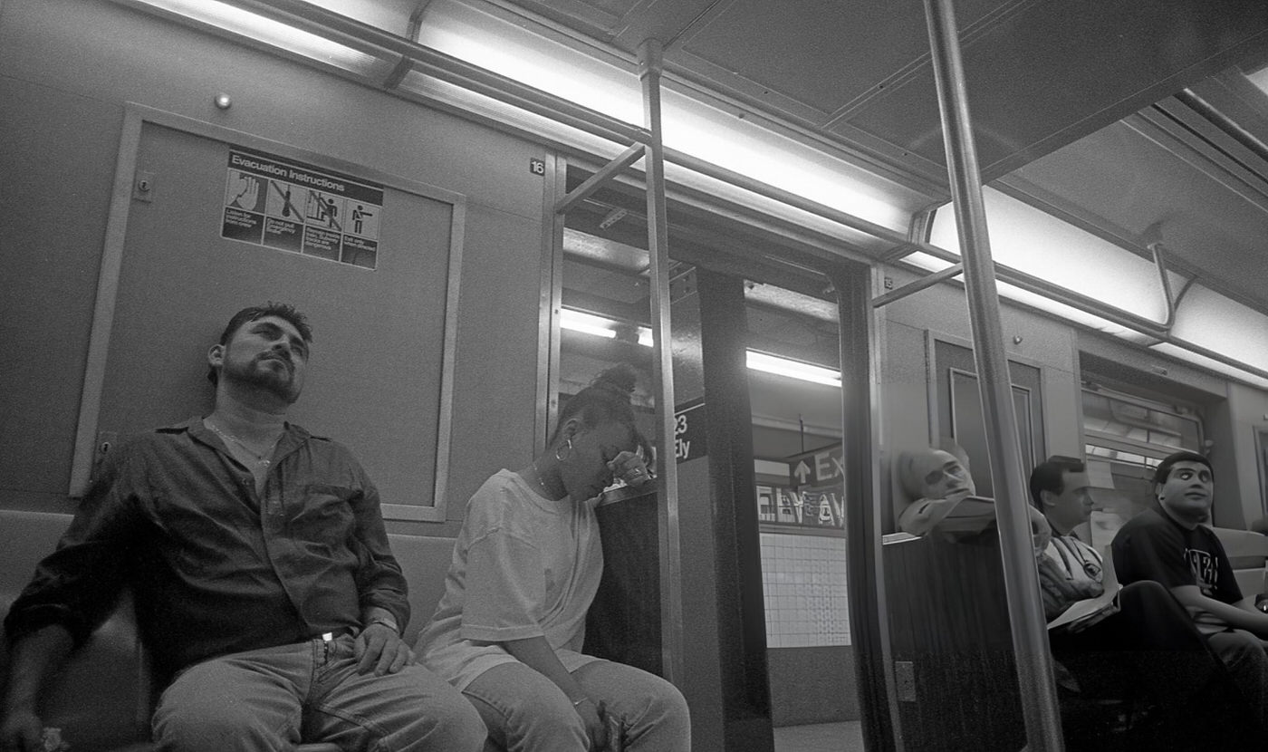 Commuters Seated On An E Train At The 23Rd Street - Ely Avenue Station, Queens, 1995.
