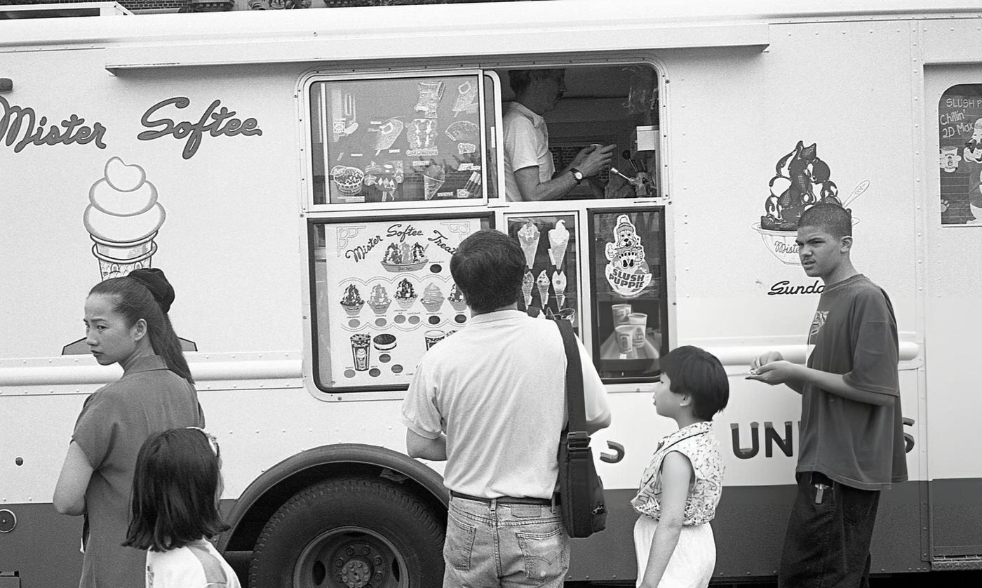 A Group Of Adults And Children Gathered Around The Mister Softee Ice Cream Truck On 63Rd Drive In The Rego Park Neighborhood, Queens, 1995.