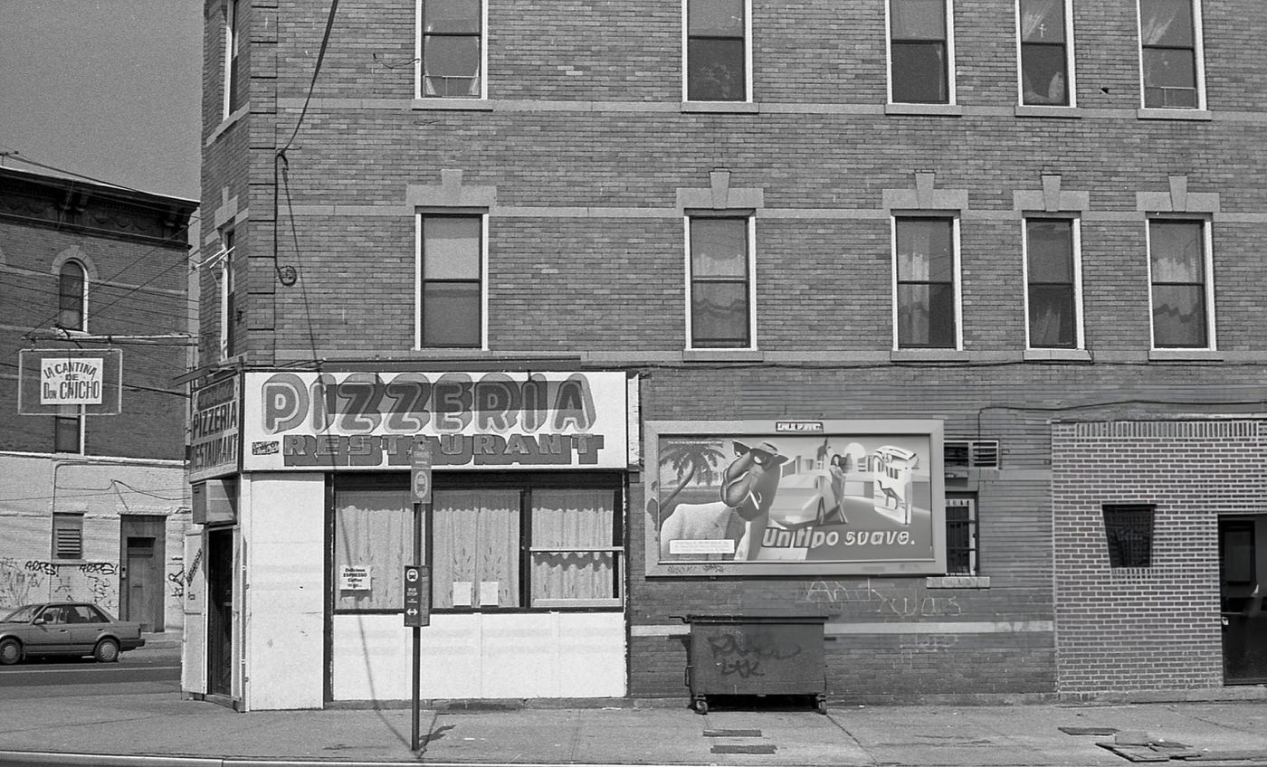 La Cantina De Don Chicho Pizzeria At The Intersection Of Junction Boulevard And Corona Avenue In Corona, Queens, 1990.
