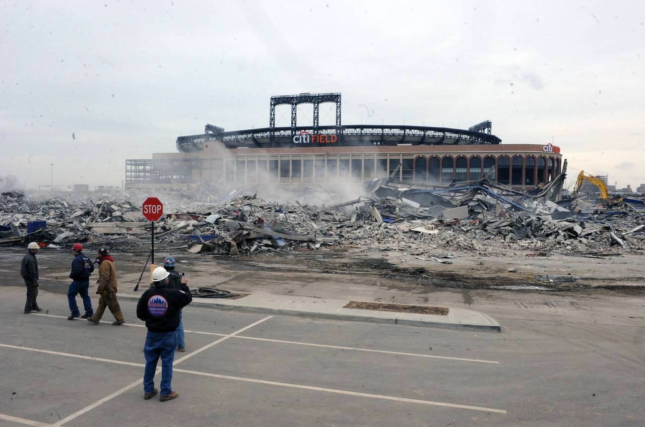 A Construction Crew Razes Shea Stadium In The Shadow Of Citi Field, Queens, 2009.