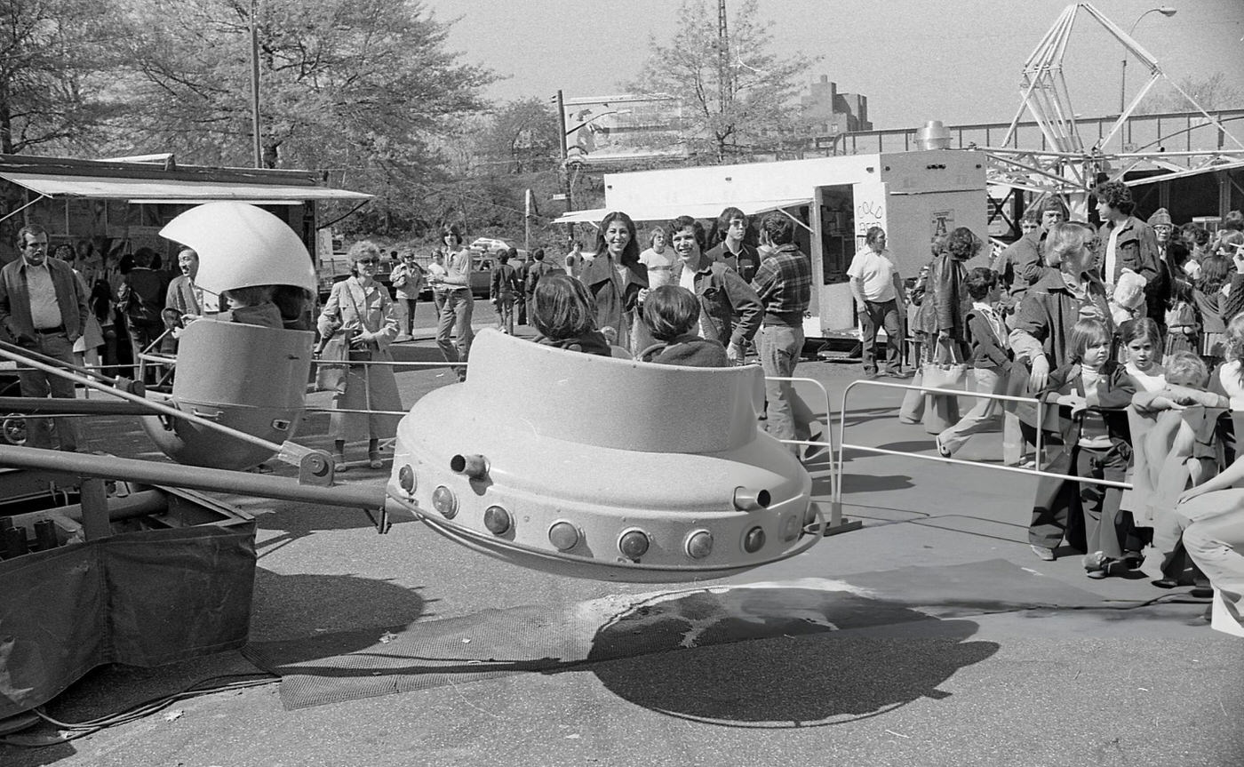 Parents Watching Their Children On One Of The Rides At The Resurrection Ascension Church Carnival In Rego Park, Queens, 1979.