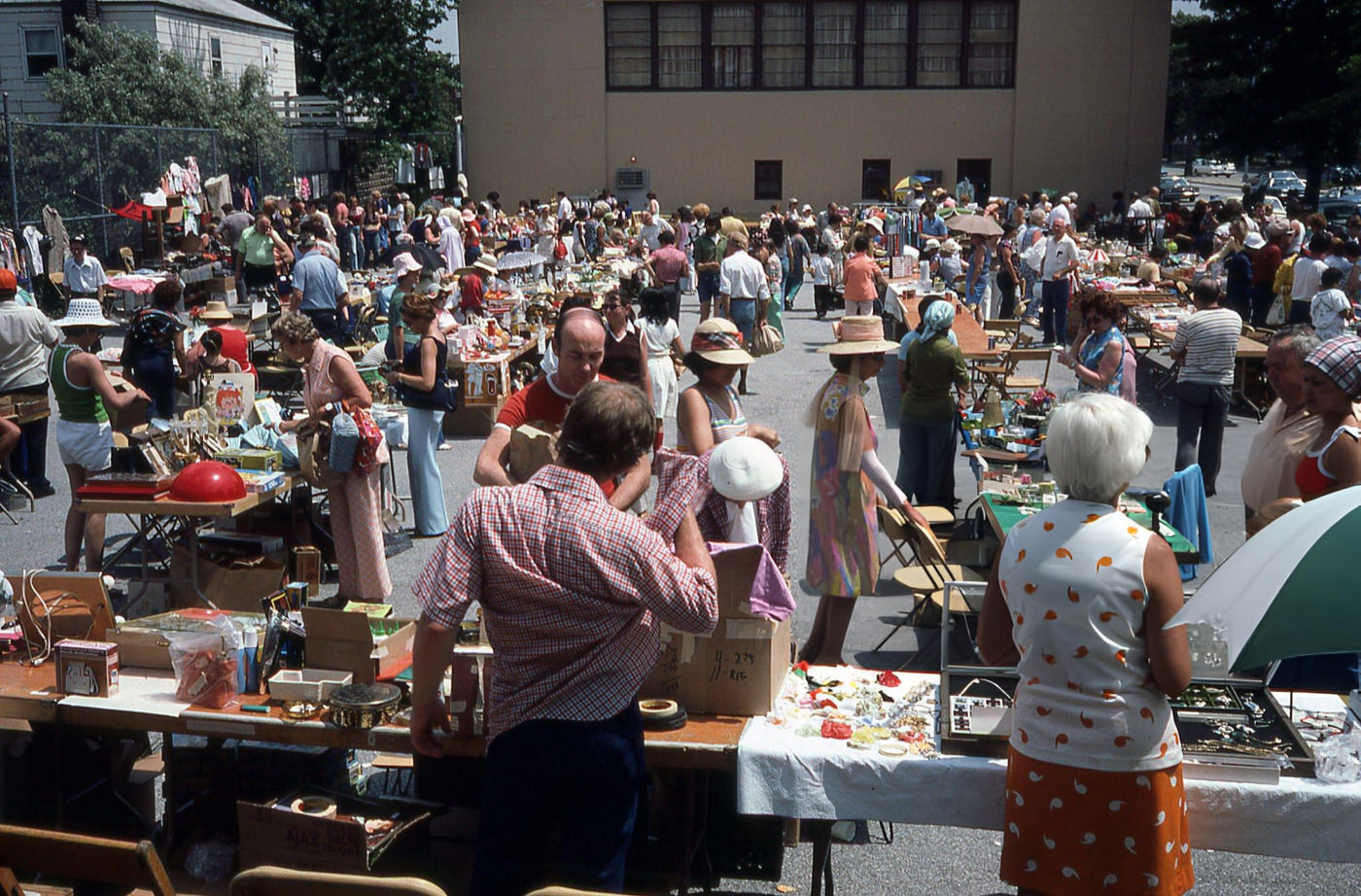 Vendors And Customers At An Outdoor Flea Market On Woodhaven Boulevard In Rego Park, Queens, 1970S.