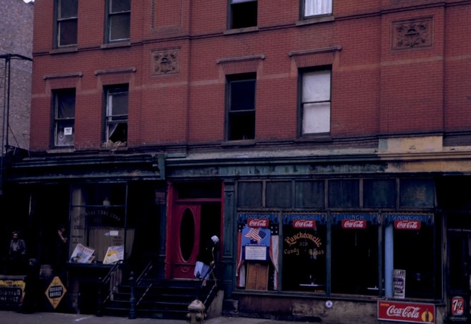 Store Fronts Below Brick Tenement, 1942