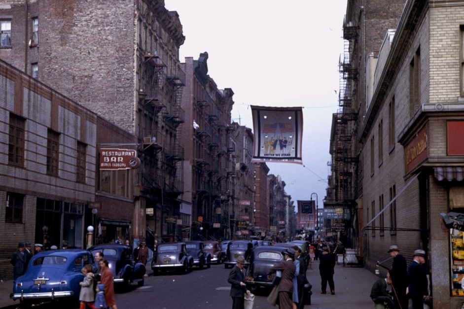 Two Views Looking Up A Street Of Many Races, Lower Manhattan, 1942