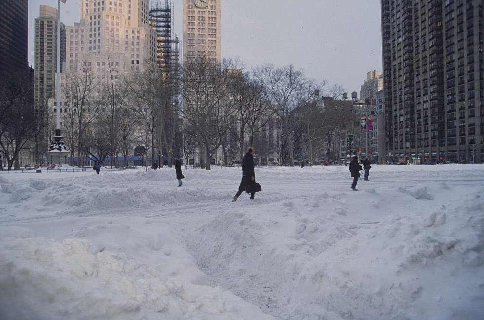 Pedestrians Walking Across Park Buried In Snow, 1996