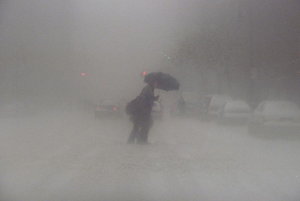 Pedestrian Slowly Makes His Way Across Pike St. During A Blizzard, 1996