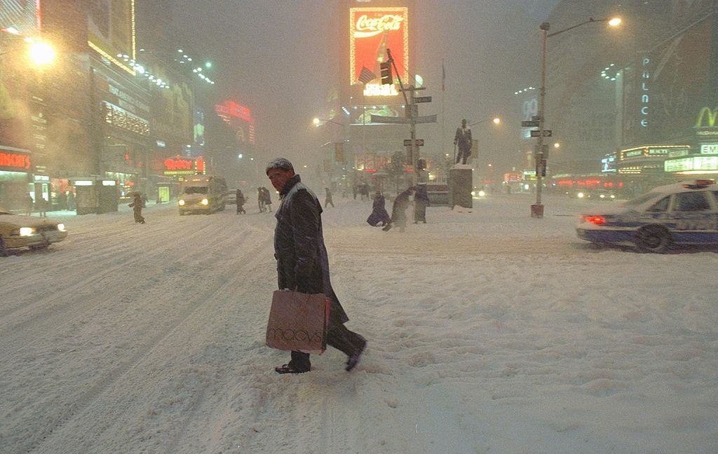 Pedestrian Carefully Crosses The Street In Times Square During The Blizzard, 1996