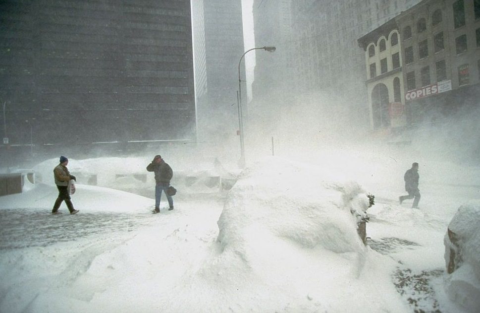 Several Hardy Souls Crossing Windy, Snowswept Plaza During Blizzard Of 1996,