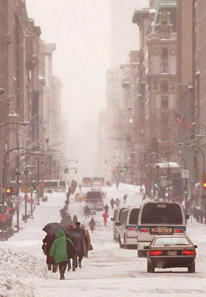 A Line Of Pedestrians And Vehicles Wind Their Way Down New York'S Fifth Avenue , 1996