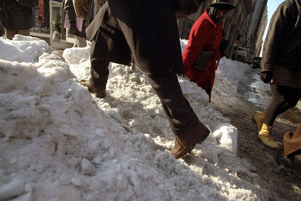 New Yorkers Climb Mound Of Snow At The Curb As They Begin To Head Back To Work After A Blizzard, 1996