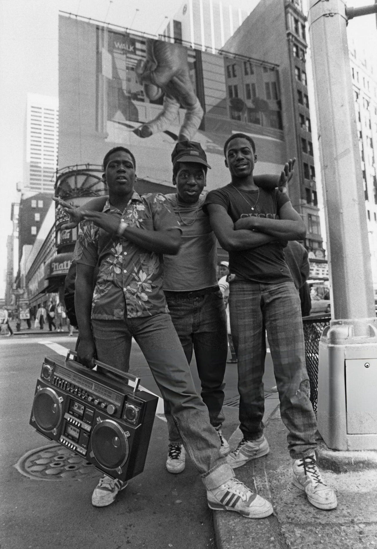 Three Teenage Boys Posing In Times Square With A Boombox, 1987.