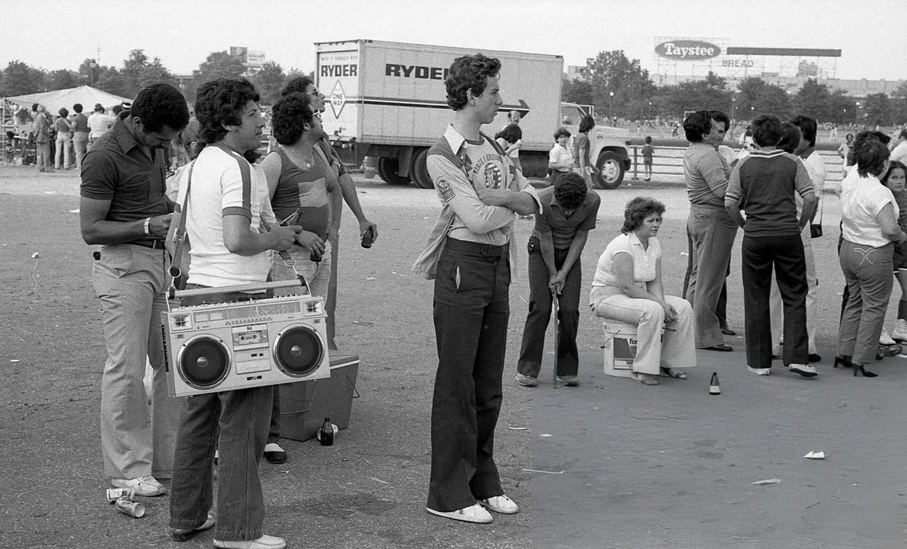 A Group Of People Waiting In Line At Flushing Meadows Park, Queens, New York City, 1980.