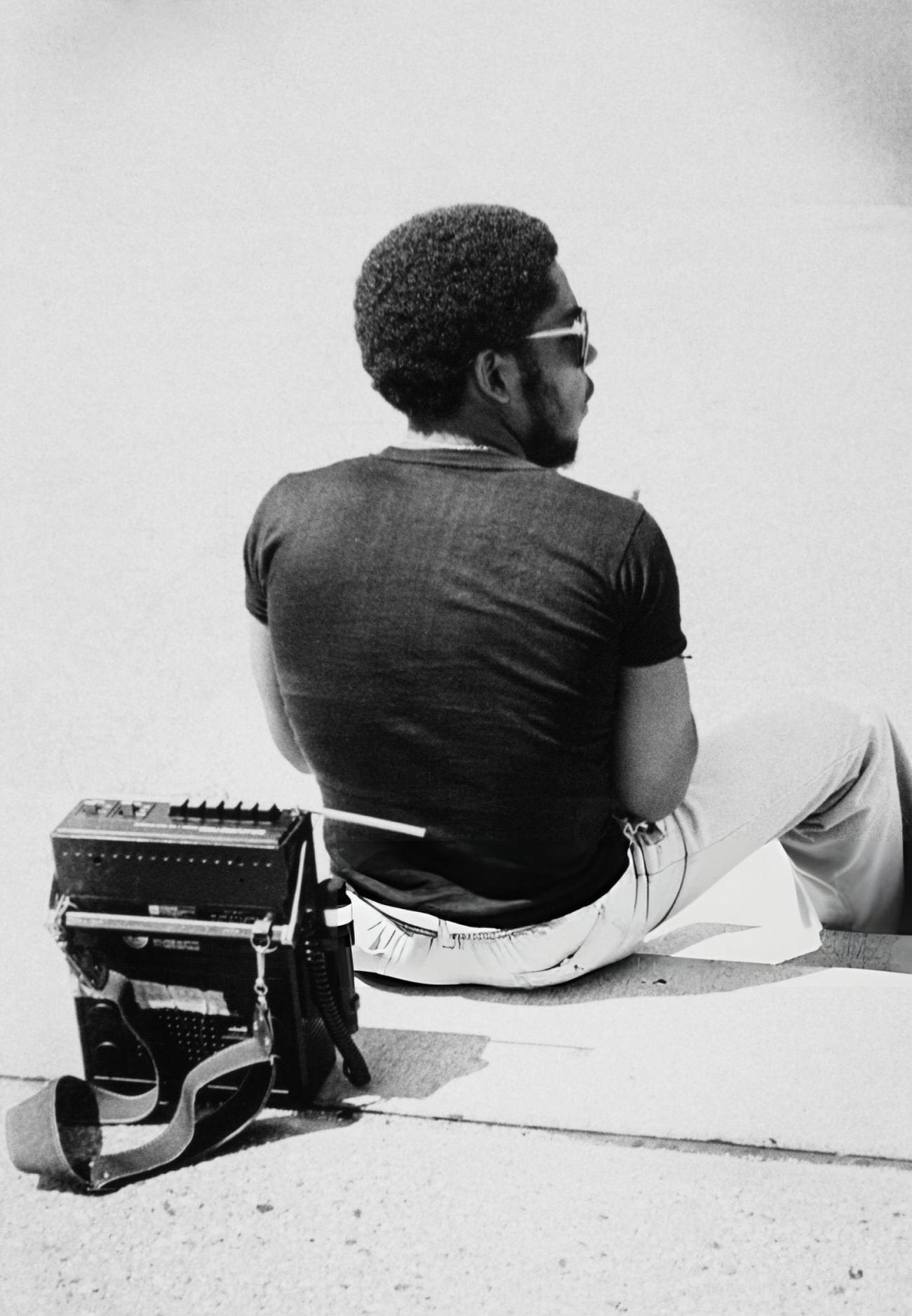 A Man Sitting With A Boombox, 1980.