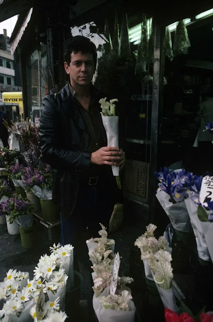 Reed With Flowers On New Year’s Day, 1982.