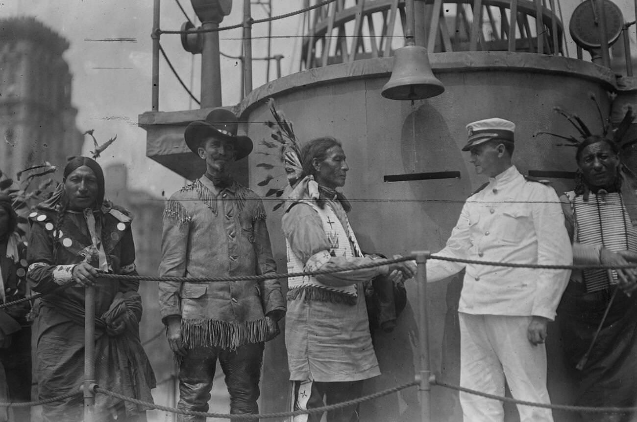 Native American &Amp;Quot;Chief Bald Eagle&Amp;Quot; Shaking Hands With Lieutenant Wells Hawks, A Member Of The Navy'S Public Relations Team Aboard The Uss Recruit, 1917.