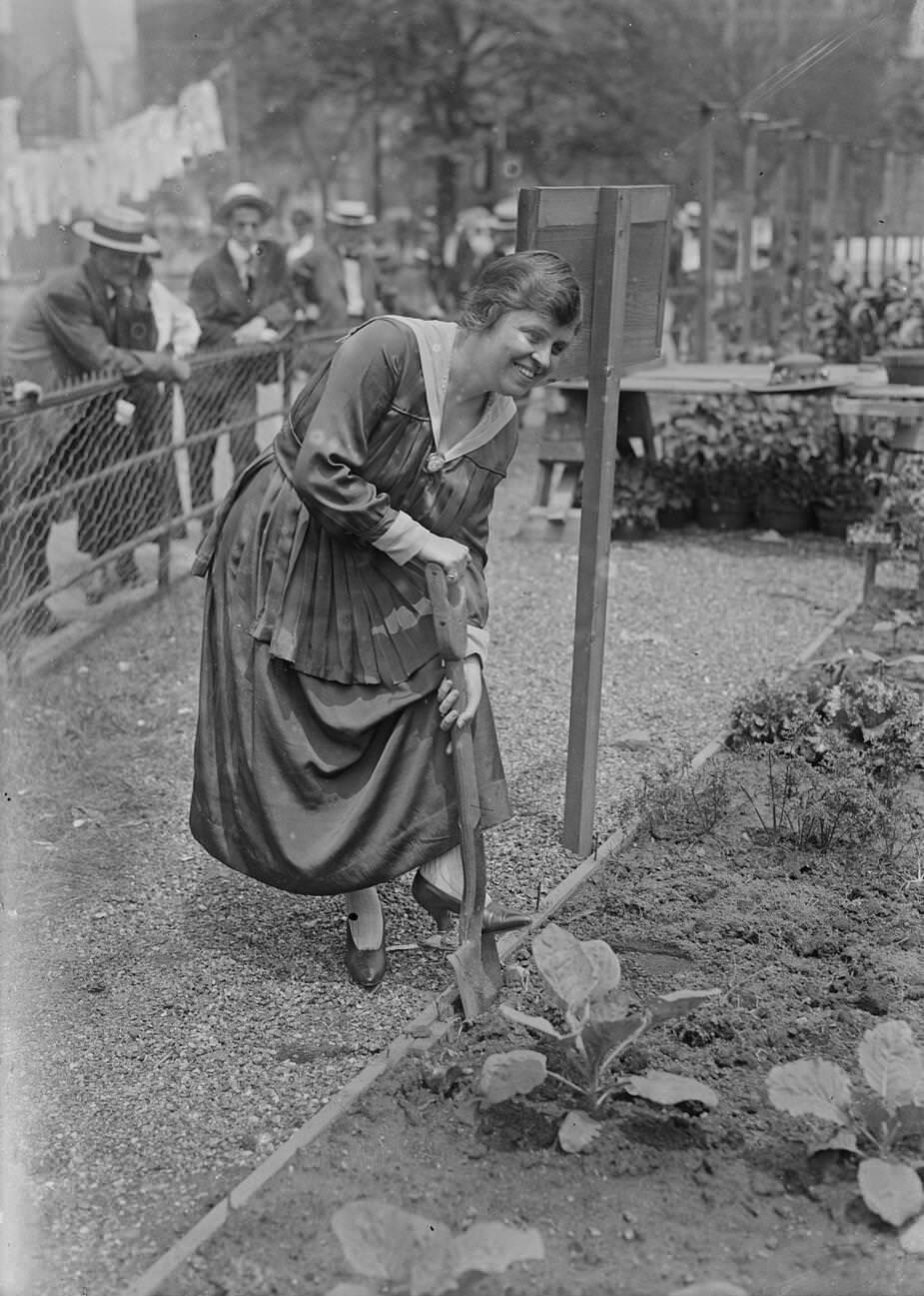Soprano Opera Singer Mabel Garrison Siemonn, Digging A Spade Into The Ground At A Demonstration Garden Next To The Uss Recruit, 1917.