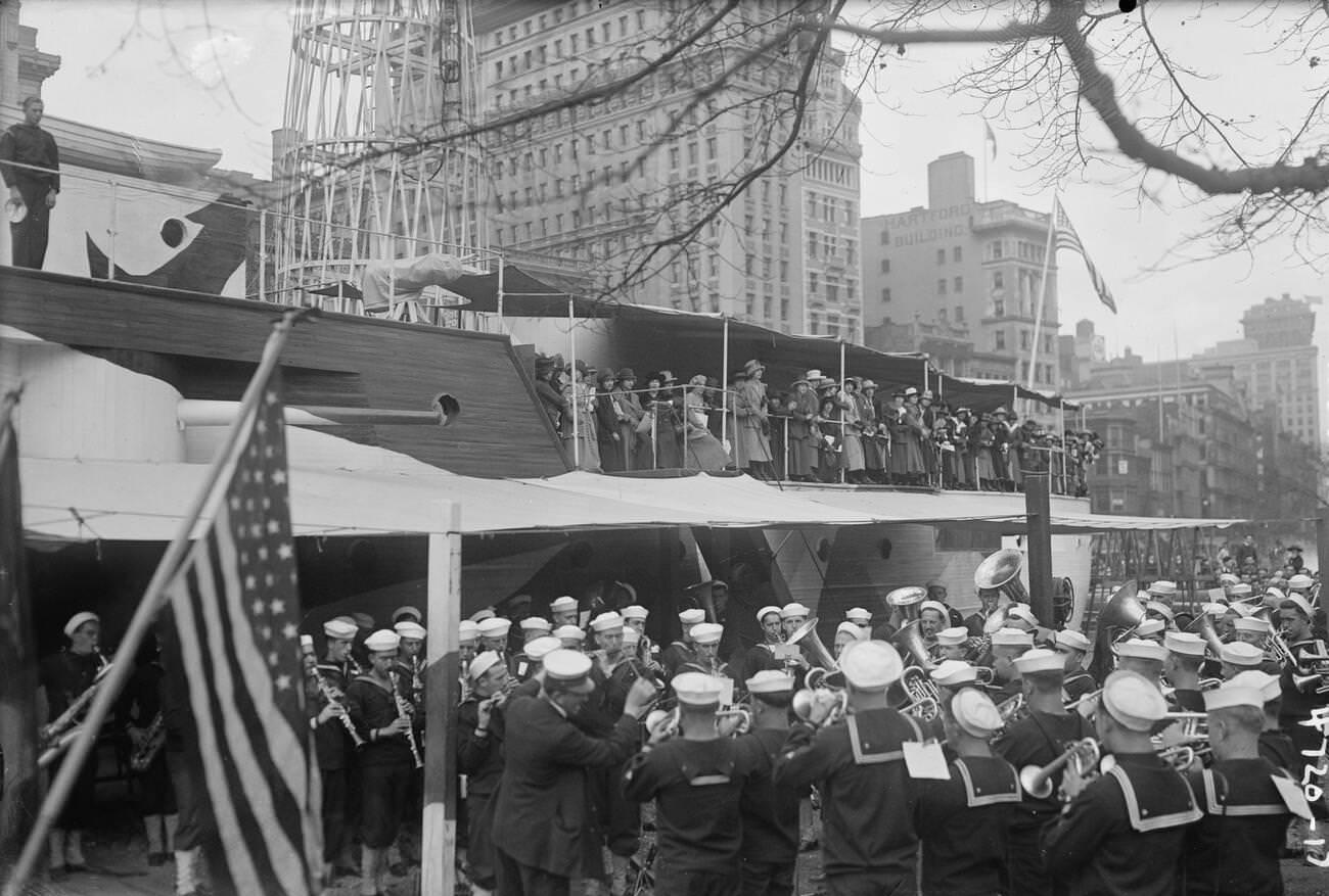A Military Band Playing Next To The Uss Recruit, 1910S.
