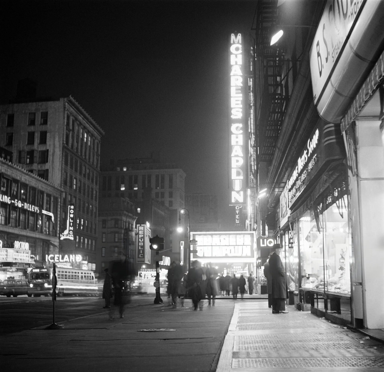 People Walk On Broadway At Night, 1947.