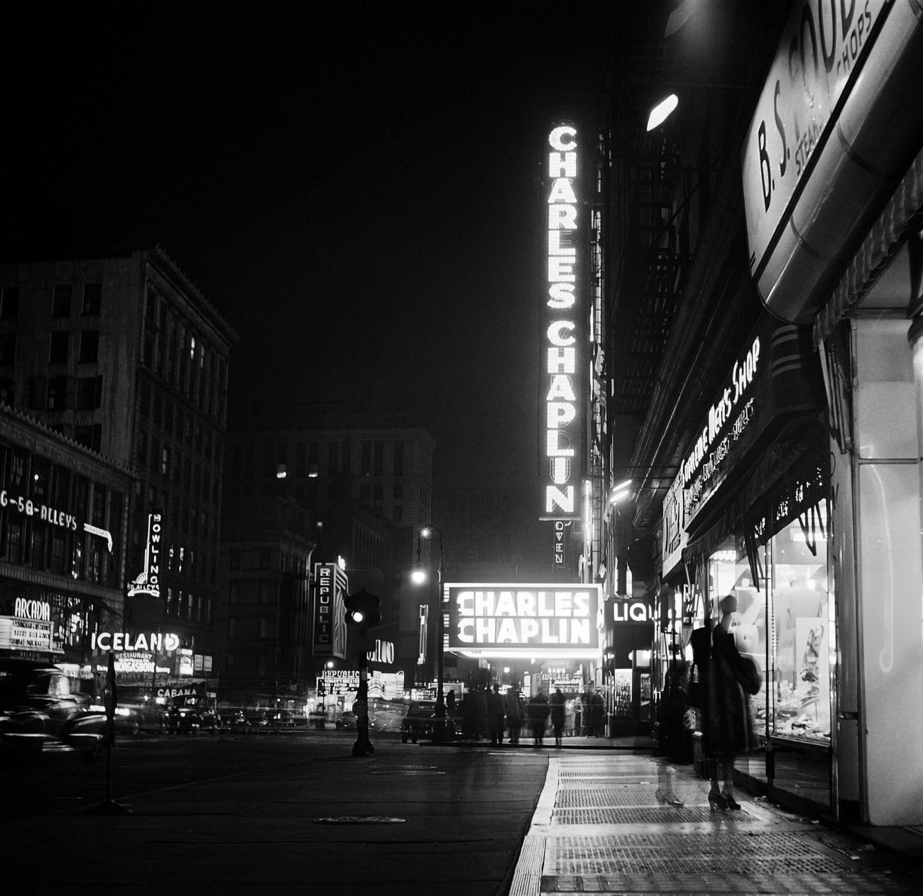 People Walk On Broadway At Night, 1947.