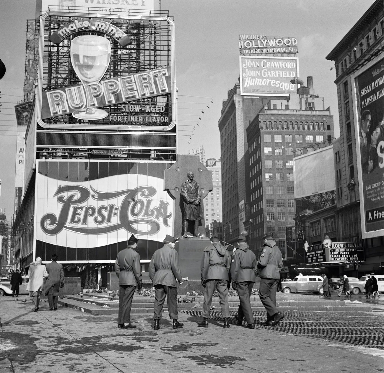 Five Soldiers Stand In Front Of The Statue Of Father Duffy, 1947.